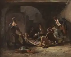 Un marchand déplie un tapis pour montrer ses marchandises dans le ghetto de Rome.