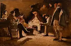 Un groupe d'une demi-douzaine de personnes se regroupent autour d'un feu de camp dans la campagne italienne.