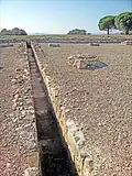 Oppidum de Ruscino, canal d'évacuation des eaux. Château-Roussillon, Pyrénées.