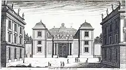 Blason abrité dans un cartouche en acrotère (hôtel de Cossé).