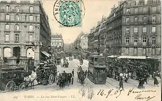 La rue Saint-Lazare au tout début du XXe&nbsp;siècle supportait déjà un important trafic de véhicules de transports en commun : de nombreux omnibus et tramways à air comprimé de la CGO.