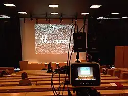 Conférence au sein de l'auditorium de l'université.