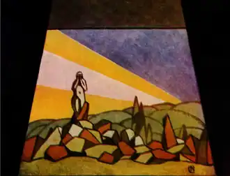 Maquette de décor représentant un sommet de falaise et une statue de femme