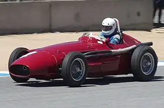 Une Maserati 250F de 1957 lors de la parade sur le circuit de Laguna Seca, lors du Monterey Motorsports Reunion de 2014.