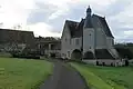 Le porche du château de Pescheray, au Breil-sur-Mérize