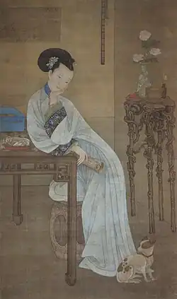 Leng Mei. Jolie femme dans un intérieur, et un petit chien. Daté 1724. Rouleau suspendu, encre et couleurs sur soie. 175 x 94&nbsp;cm