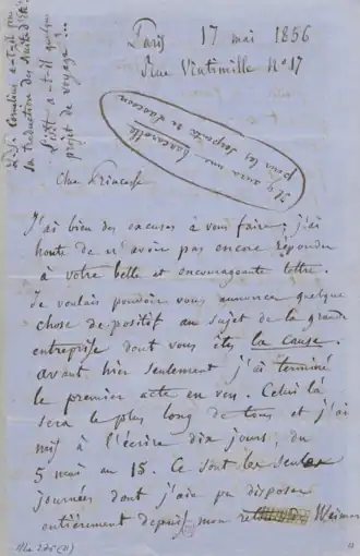 Lettre manuscrite sur papier bleu.