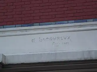 Signature d'Edmond Lamoureux sur l'immeuble du 41, rue Chaptal.