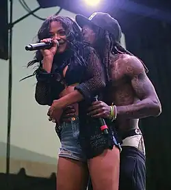 Christina Milian et son ex-compagnon le rappeur Lil Wayne en 2014. Festival de musique, New York.
