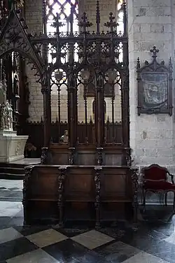 Stalles (1877) et cloison du chœur (vers 1857)