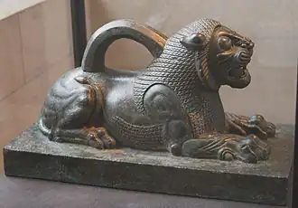 Poids en forme de lion, bronze.