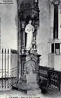 Statue de saint Colomban dans l'église Saint-Sauveur de Locminé (carte postale Henry Guillon, vers 1930).