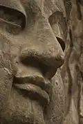 Détail du traitement du visage de Buddha