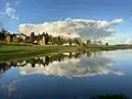 Reflets du Chateau et de l'Eglise de lugny-les-Charolles dans le débord de la rivière Arconce en Novembre 2023