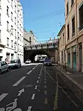 Rue Claudius-Collonge allant vers le Nord, au sud de la voie de chemin de fer.