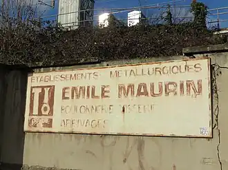 Ancien panneau des Ets Émile Maurin.
