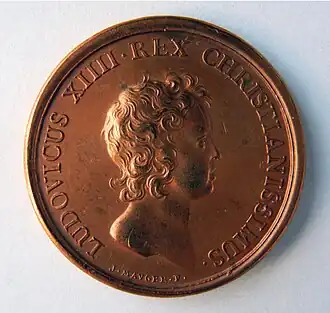 Louis XIV, médaille émise en mémoire de son 5e&nbsp;anniversaire, année de son accession au trône et de la prise de Thionville en 1643 par le Grand Condé, avers.