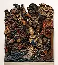 Relief en bois polychrome, vers 1520 : Martyre de Sainte Catherine.