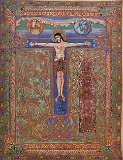 Folio 6v, page du Te igitur, le T reprenant la croix de la Crucifixion