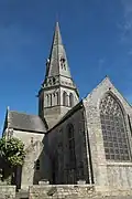 Église Notre-Dame-de-Joie : clocher et vue extérieure.