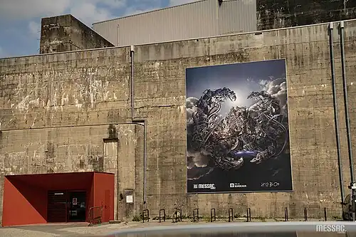 "la fin de leur monde²", Thibault MESSAC, Mois de la photographie, Base sous-marine de Bordeaux, 7m x9m, 2025