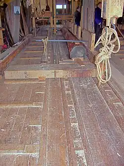 Chariot porte-grume, avec la fenêtre de délignage. Moulin Het Jonge Schaap
