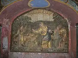 Bas-relief en bois doré du XVIIe&nbsp;siècle.