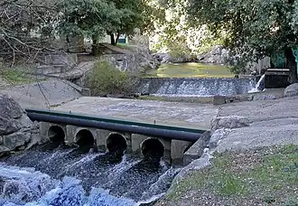 Barrage romain réutilisé, puits radier submersible.