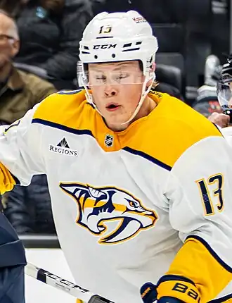 Photographie couleur d'un joueur de hockey sur glace