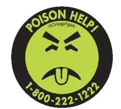 Pictogramme vert représentant un visage grimaçant, surmonté d'une mention indiquant : « Poison ! » et le numéro de téléphone d'un centre antipoison.