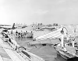 Photo montrant les dégâts du port artificiel Mulberry A après la tempête du 19 juin