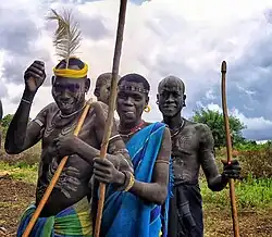 Guerriers armés de bâtons