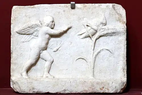 Éros pourchassant une sauterelle.