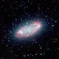 NGC 2976 en infrarouge par le télescope spatial Spitzer.