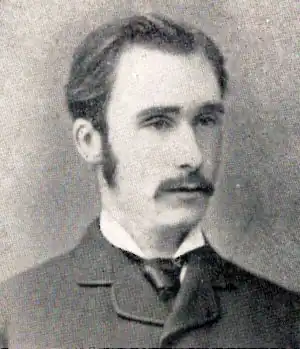 Portrait de Nathaniel Colgan à 32 ans, avec favoris et moustache bien tenus.