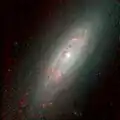 Cette image de NGC 3593 a été réalisée avec les données captées dans le domaine de l'infrarouge par le télescope spatial Hubble.