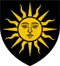 Blason en couleurs d'un soleil jaune sur fond noir, le soleil arborant les traits impassibles d'un visage humain.