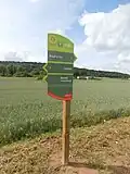 Panneau de signalisation de la Trans'Oise le long de la D 931 entre Nointel et Breuil-le-Sec.