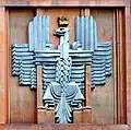 Armoiries de la Pologne, façade du bâtiment de la poste à Varsovie (1934).