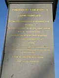 Inscription en latin d'une face du piédestal.