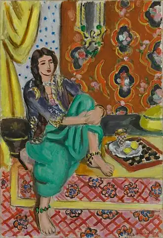 Odalisque assise, genou gauche replié, fond ornamental et damier, 1928 – Musée d'Art de Baltimore, Baltimore.