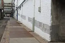 Rampe restante entre le hangar à poudre et les remparts