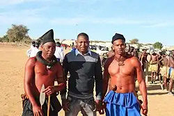 Héréros en tenue traditionnelle et moderne