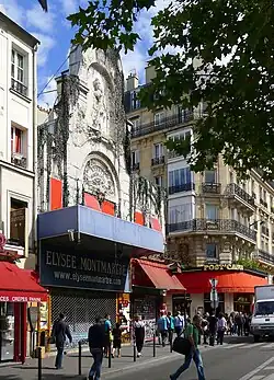 Le boulevard au niveau du no&nbsp;72 (l'Élysée-Montmartre).