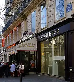 Plaque avec l'ancien nom de la place (en 2014).