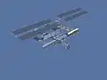 Image de synthèse de l'ISS après STS-113 (décembre 2002) : rajout de l'élément P1 à côté de S0, sur la droite de l'image (partie bâbord de la Station).