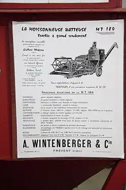 Réclame d'une moissonneuse-batteuse tractée.