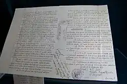 Photographie d'une feuille manuscrite écrite en français.