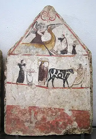 On remarque sur la fresque la représentation de Charon