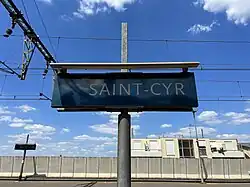 Panneau indiquant le nom de la gare.